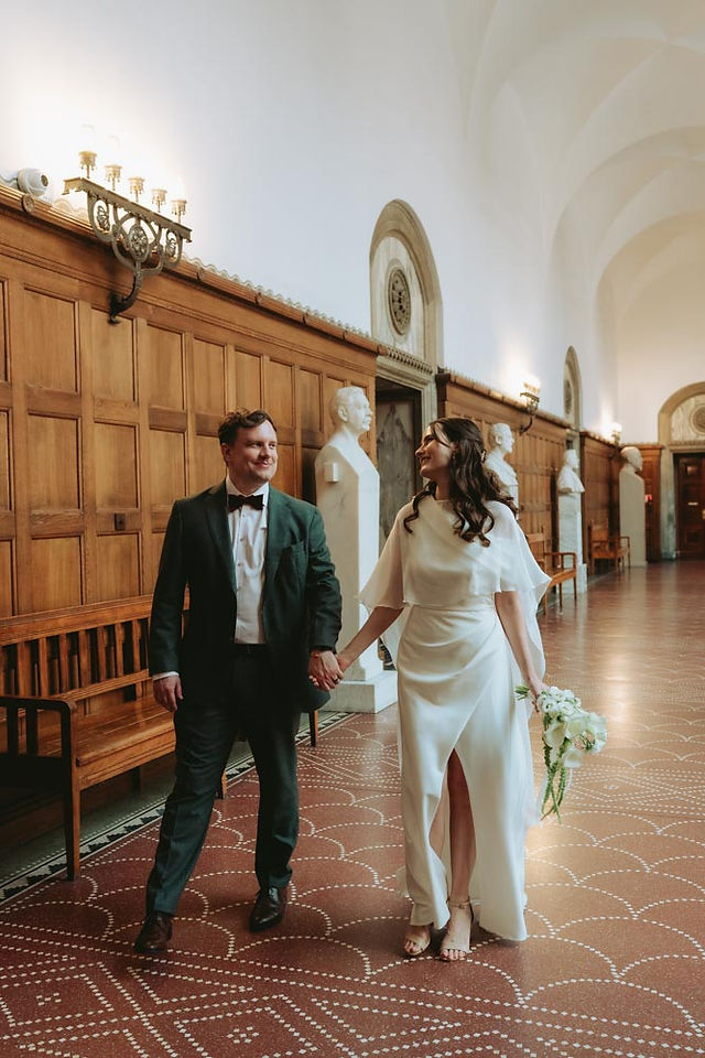 Romantic couple portraits at Copenhagen City Hall after wedding ceremony