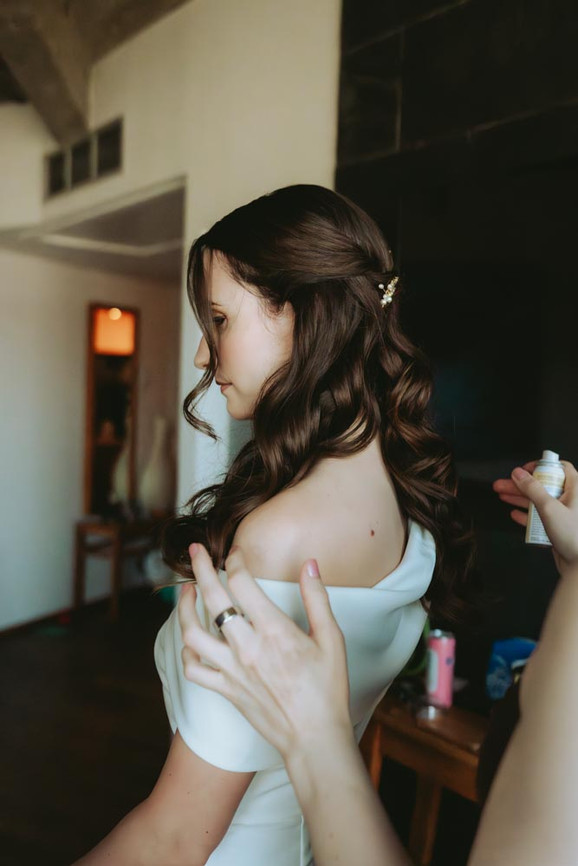Bride and groom getting ready at Hotel Manon Les Suites in Copenhagen before their wedding ceremony