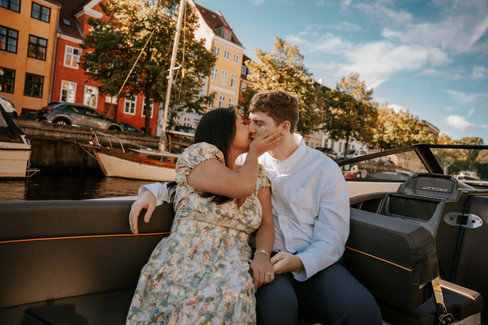 Romantic couple cuddling on a boat