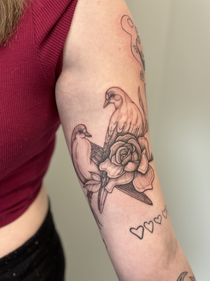 Black and grey bird tattoo