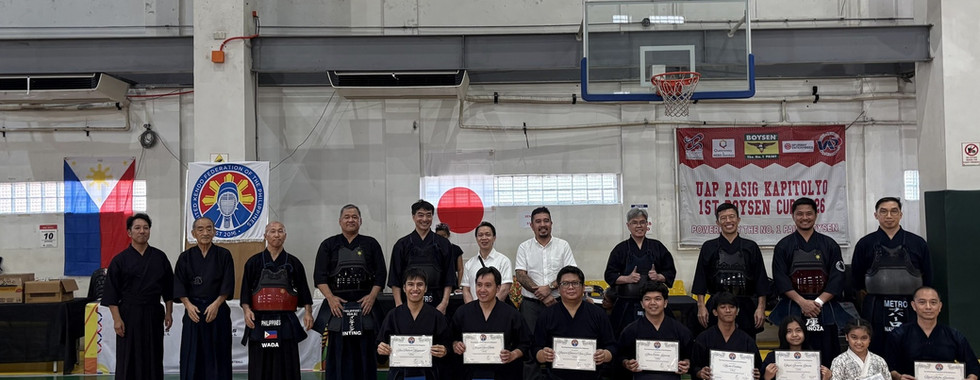 Group photo of the 1kyu passers together with the sensei