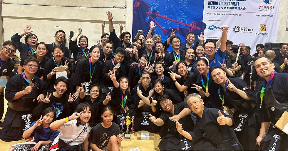 Group photo of Metroken at the Philippine National Kendo Tournament, all smiles with some wearing their medals and holding their trophies
