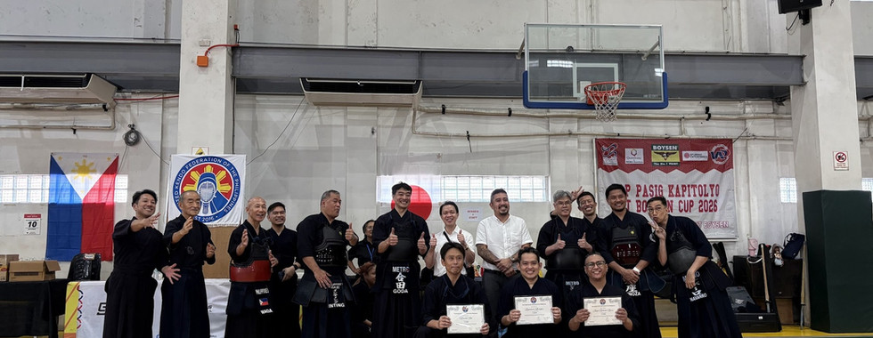 Group photo of the Sandan passers together with the sensei