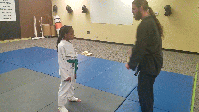 self-defense demonstration by a girl
