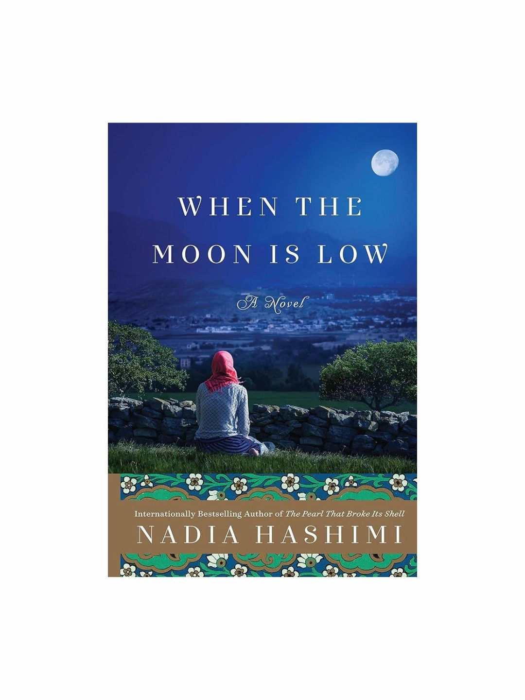 When the Moon Is Low by Nadia Hashimi, woman overlooking moonlit city