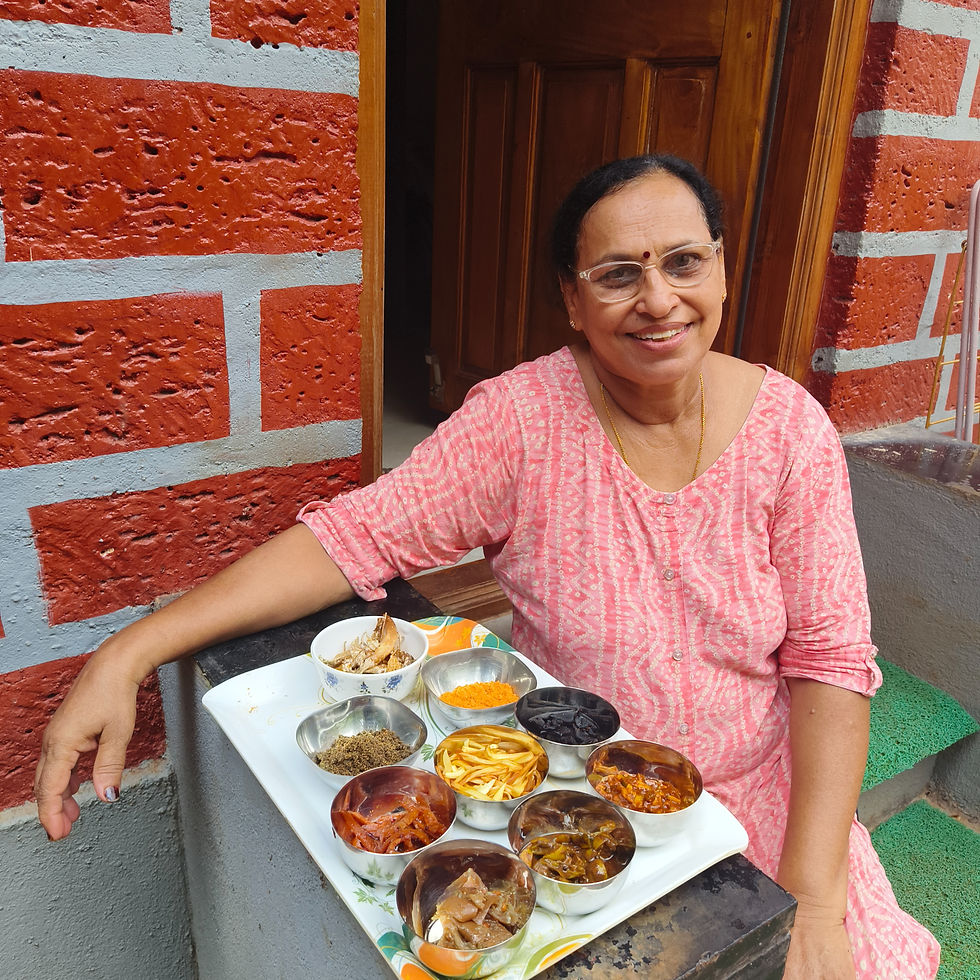 Swati Virkar at her farm with different summer pickles
