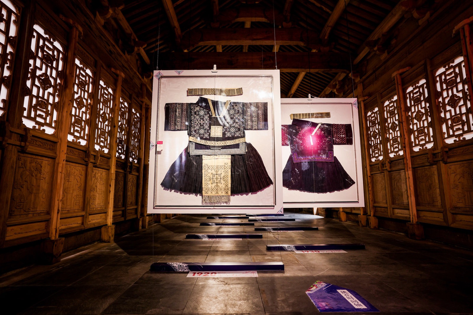 Garments and decade markers form a spatial timeline