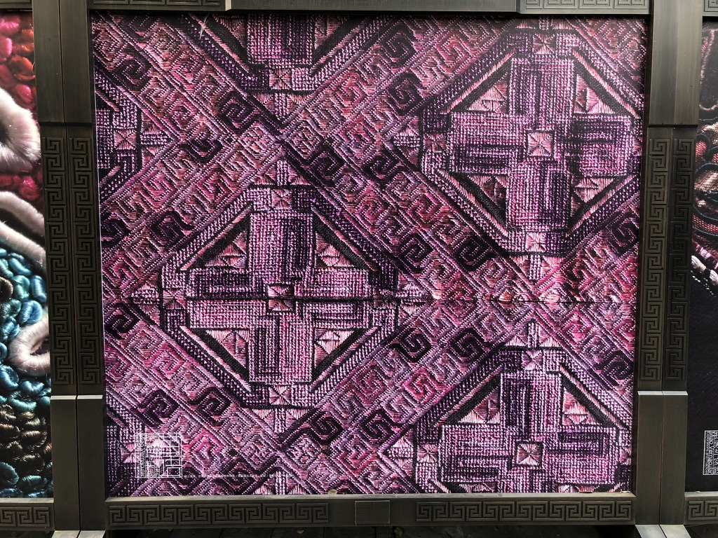 Interwoven symbols in traditional Miao embroidery · Detail