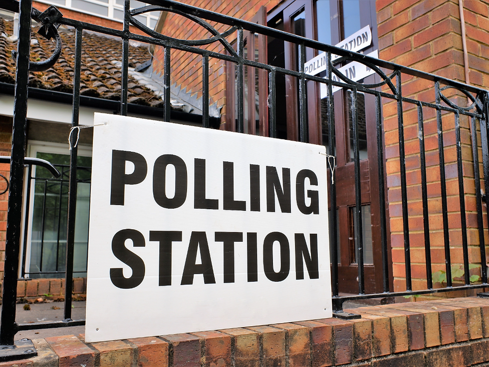 Polling station sign - people with dementia may need more helping getting to the polling station as well as with voting