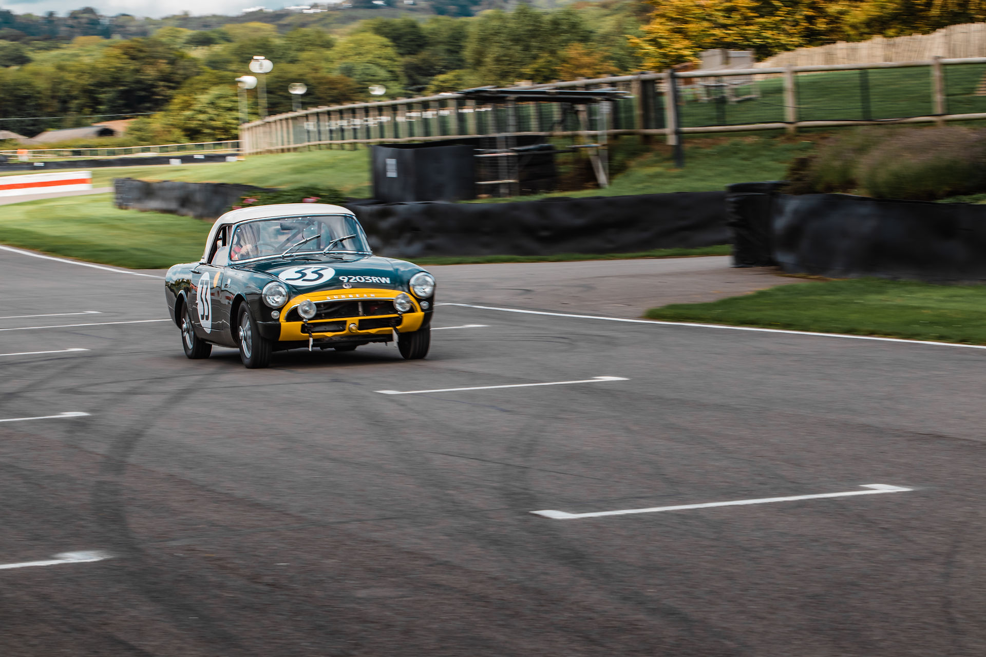 Classic car on Goodwood Motor Circuit for Dementia Support Charity Track Day