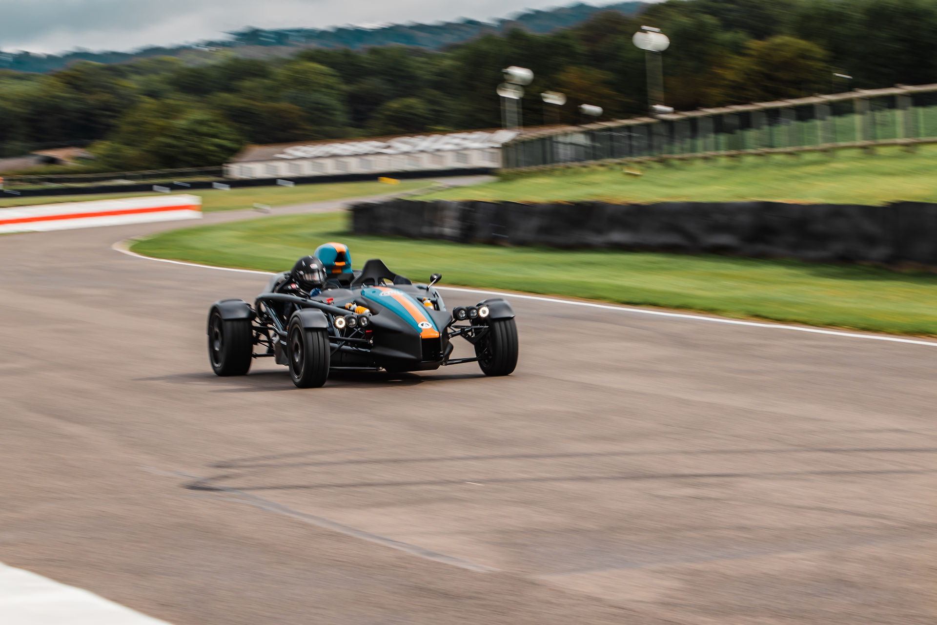 Racecar on Goodwood Motor Circuit for Dementia Support Charity Track Day