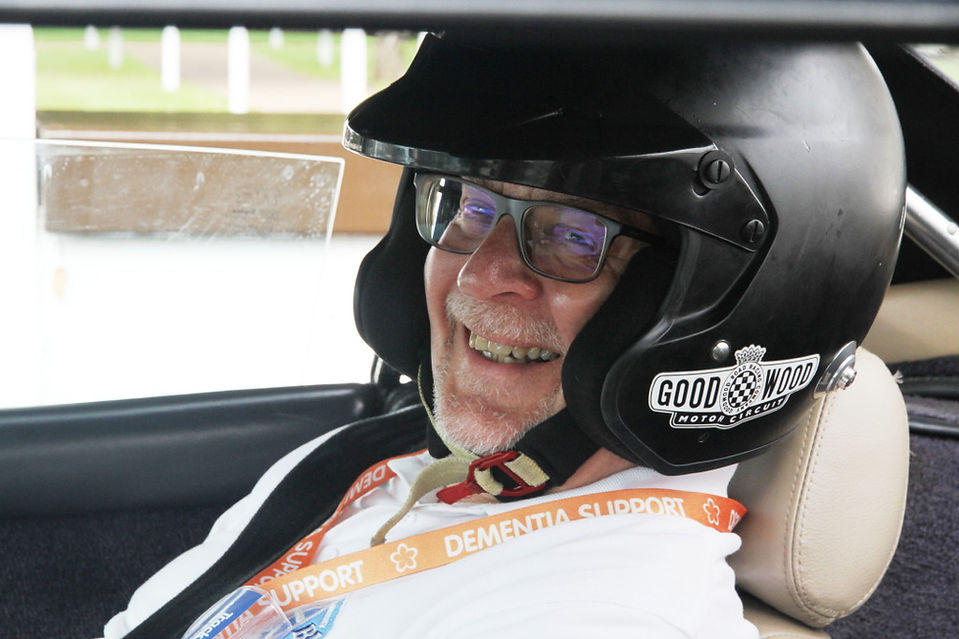 Man in crash helmet at charity Goodwood Track Day