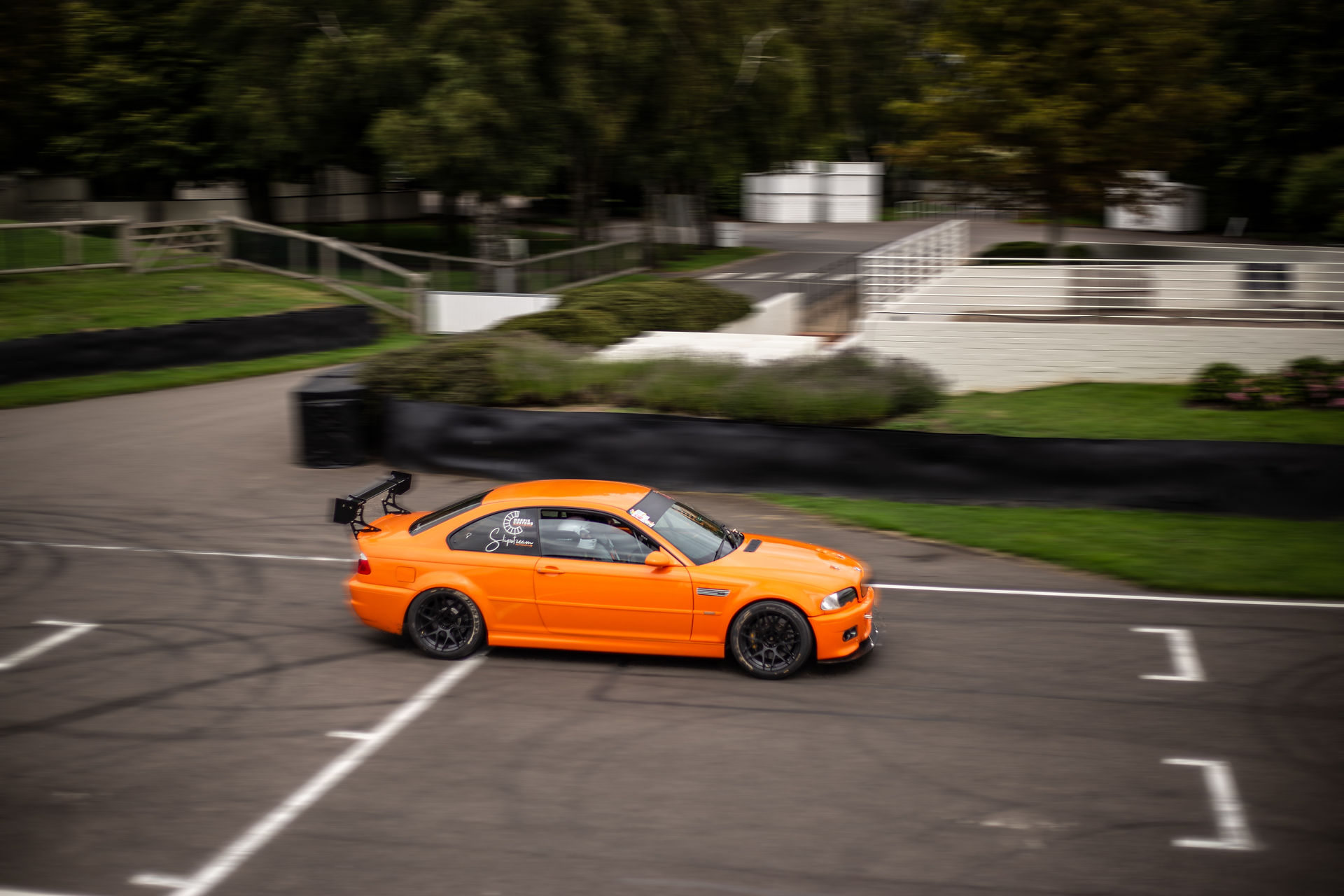 Modified BMW car on Goodwood Motor Circuit for Dementia Support Charity Track Day