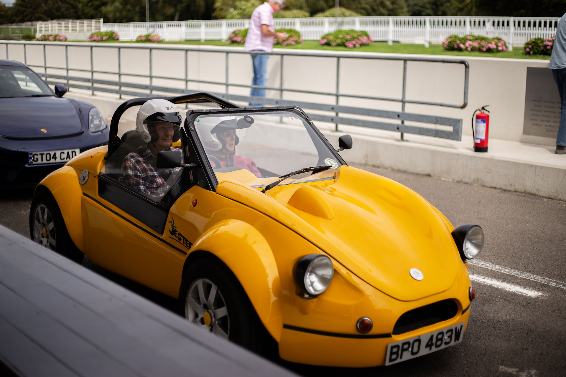 Yellow race car at Goodwood Motor Circuit for Dementia Support Track Day