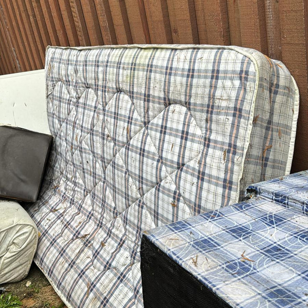Old sofa and bed collected for disposal