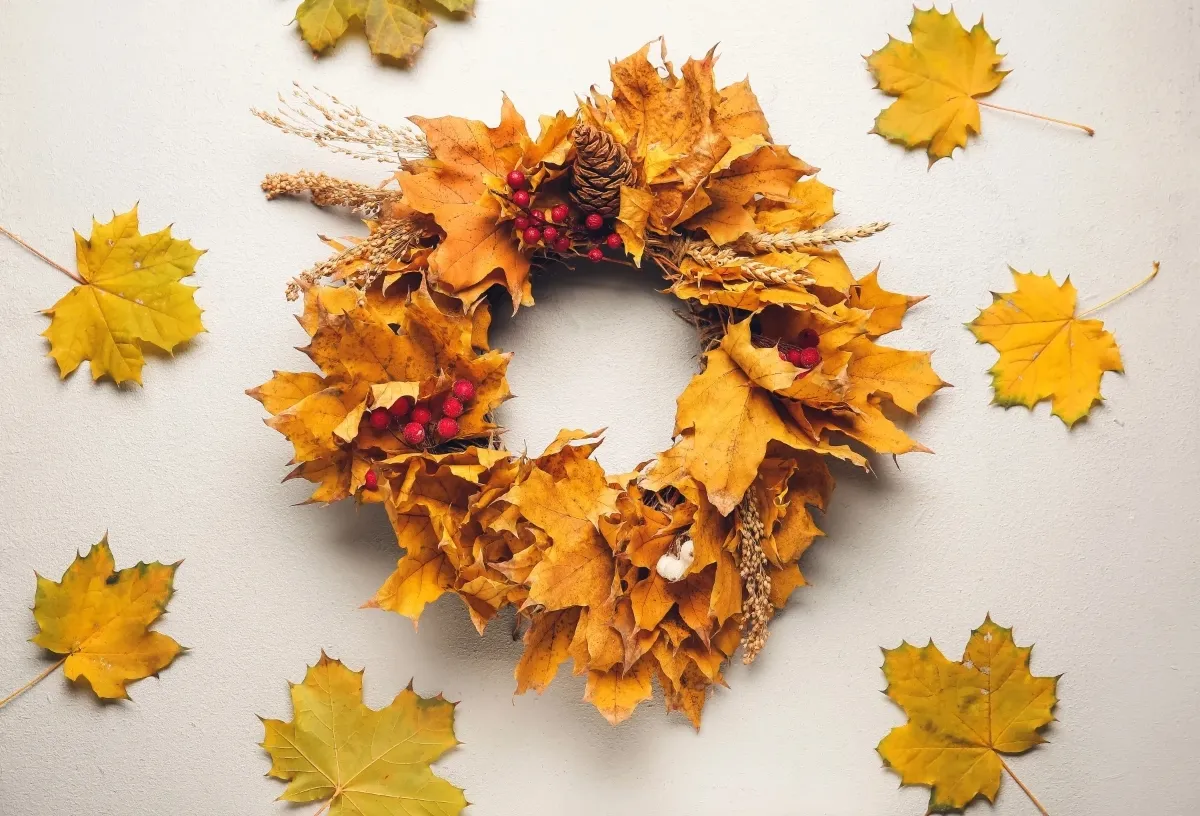 fall reaths for front door styling at autumn with amber leaves of red orange and crimson using natural elements for DIY wreaths inside and outside home all year round
