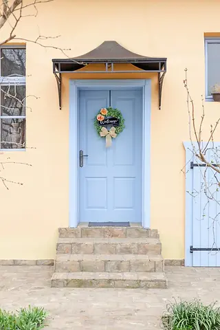 welcome wreaths on front door porch for year round wreath decor to elevate curb appeal and increase home sales with luxury front entrance for warm welcomes year round and all seasons for realtor closing gifts