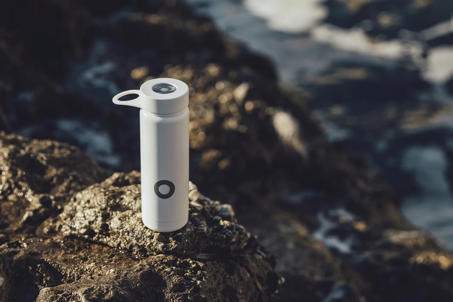 Stainless steel water bottle in rocky landscape to show durability and idea for mens gift or brother or grandpa who needs something unique and thoughtful for their special occasion even when they are hard to buy for
