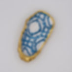 Blue and gold patterned oyster shell dish