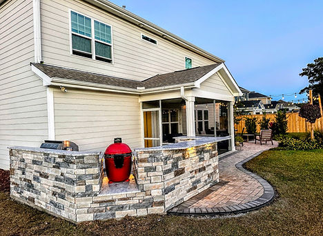Custom outdoor kitchen by Tim McAuliffe, back view of wall