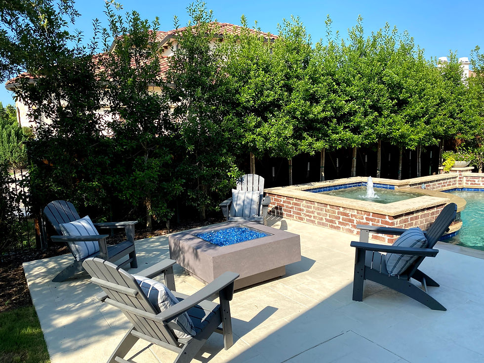 Custom hardscape design by Tim McAuliffe with fire pit, patio, pool and spa