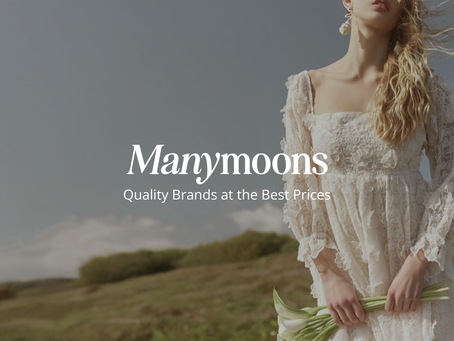 Woman in a lace dress holds lilies in a field under a blue sky. Text: "Manymoons. Quality Brands at the Best Prices."