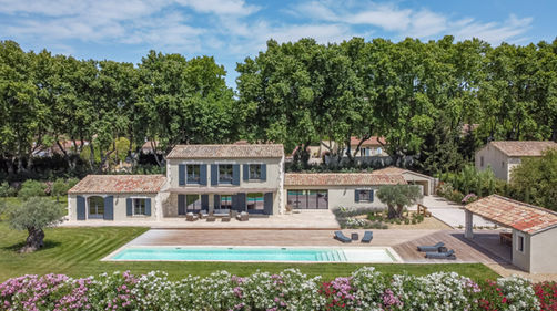 Provençal villa with swimming pool and flowering garden at a holiday rental property in Maussane