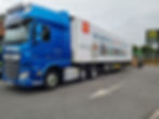 Blue DAF truck with McDonald's refrigerated trailer