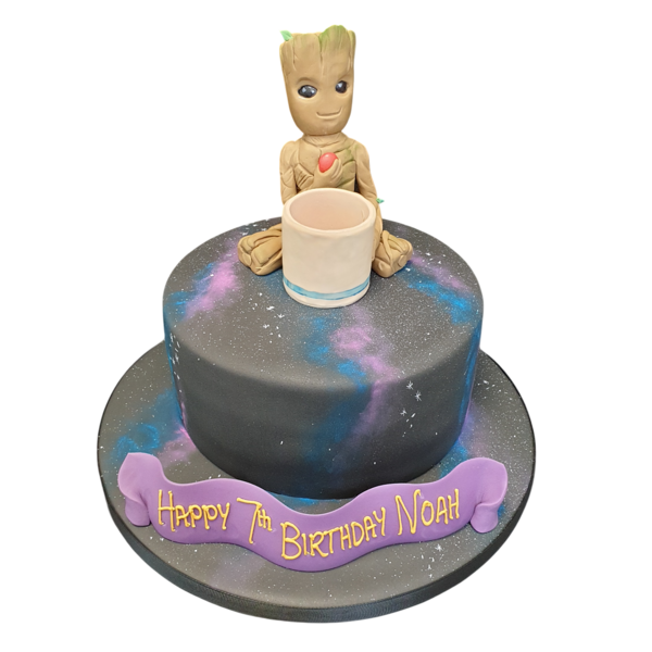 Beautifully decorated novelty cake inspired by the character Groot from Guardians of the Galaxy. Perfect for fans of the iconic film series.