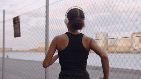 Young_Woman_In_Sportswear_And_Headphones_fhd-ezgif.com-video-to-gif-converter.gif