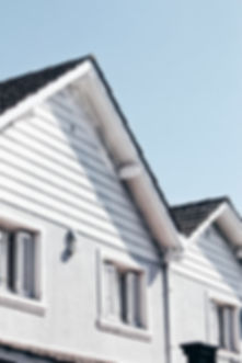 front of two side by side houses
