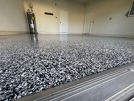 Fort Lauderdale Flake Epoxy flooring with black, grey, and white with a durable finish