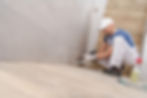 worker-sealing-ceramic-tiles-Z8NUC9A.jpg