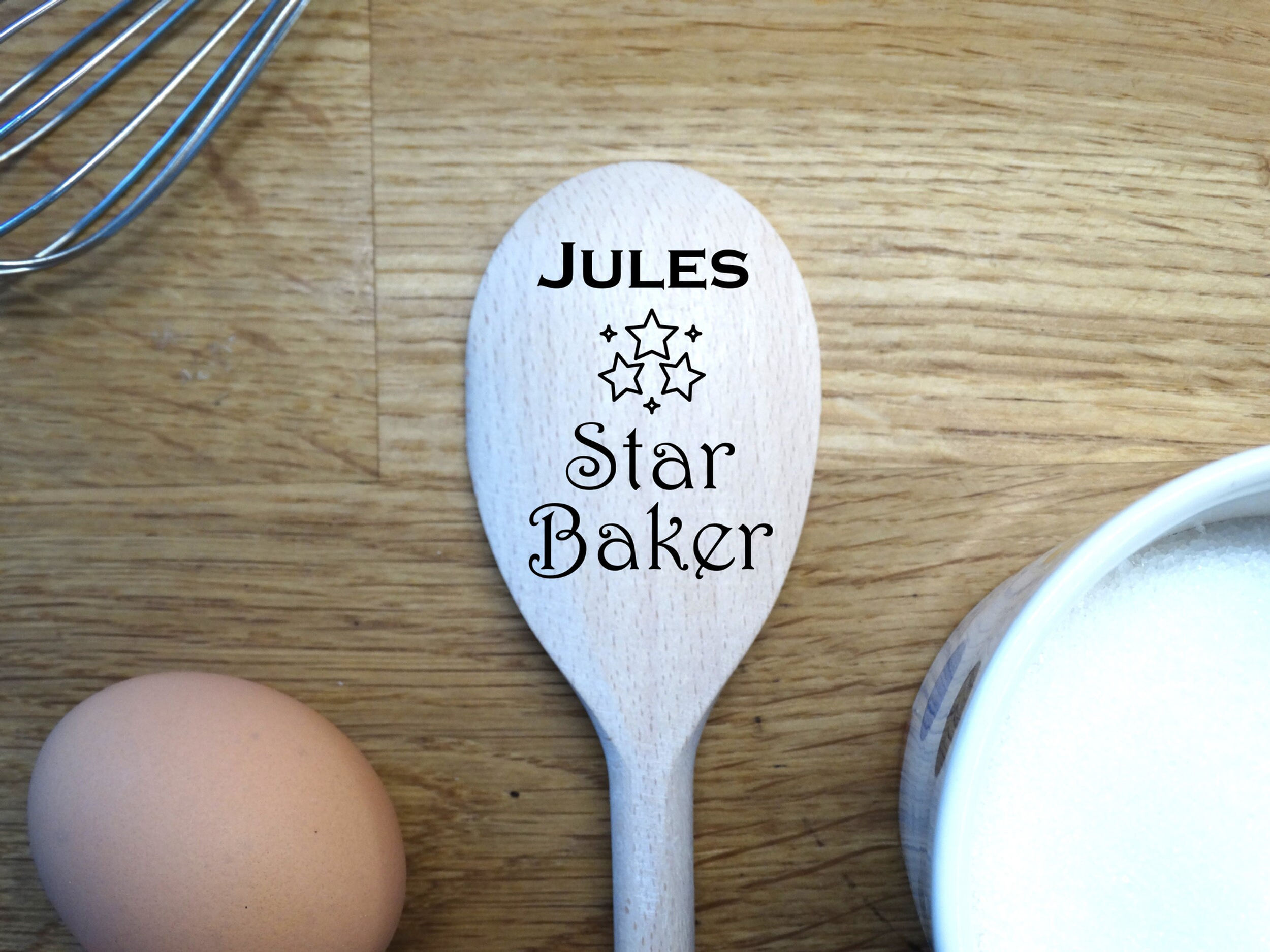 Name + "Star Baker" Engraved on a Personalised Wooden Spoon, with stars image. Product example for customers