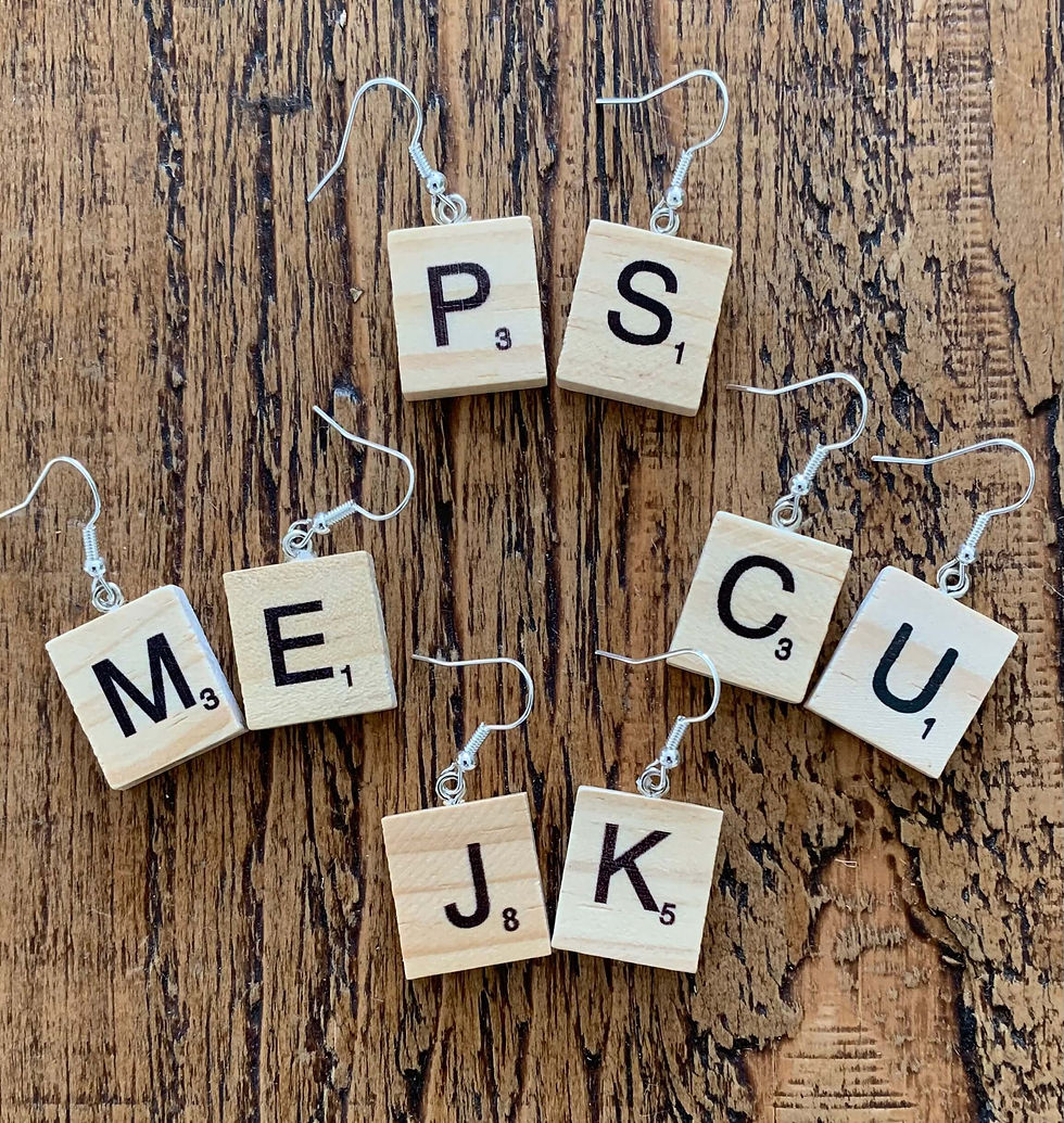 Thumbnail: Example of the product for customers. Silver plated dangle drop earrings with a wooden tile on each, that has one letter prin
