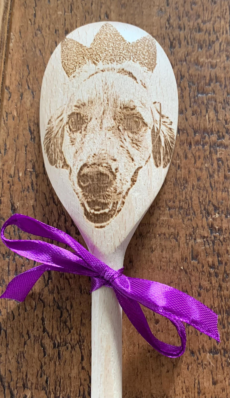 Thumbnail: Photo of a pet dog labrador's face engraved onto a wooden spoon. Example for customers of this product.