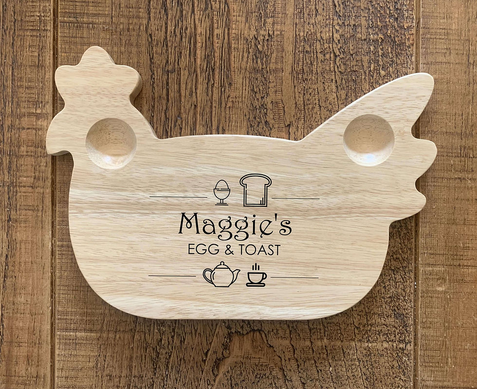 Thumbnail: Wooden egg board with two egg holders and toast area