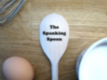 "The Spanking Spoon" Message Engraved onto a wooden spoon. Example of the product for customers.