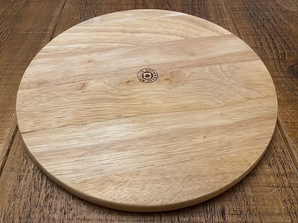 Thumbnail: 30cm round wooden pizza board personalised with an engraving of a message from the buyer. Gift available to buy.