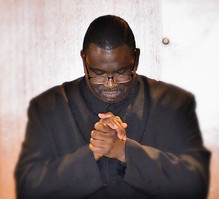 The Pastor Praying_edited_edited.jpg