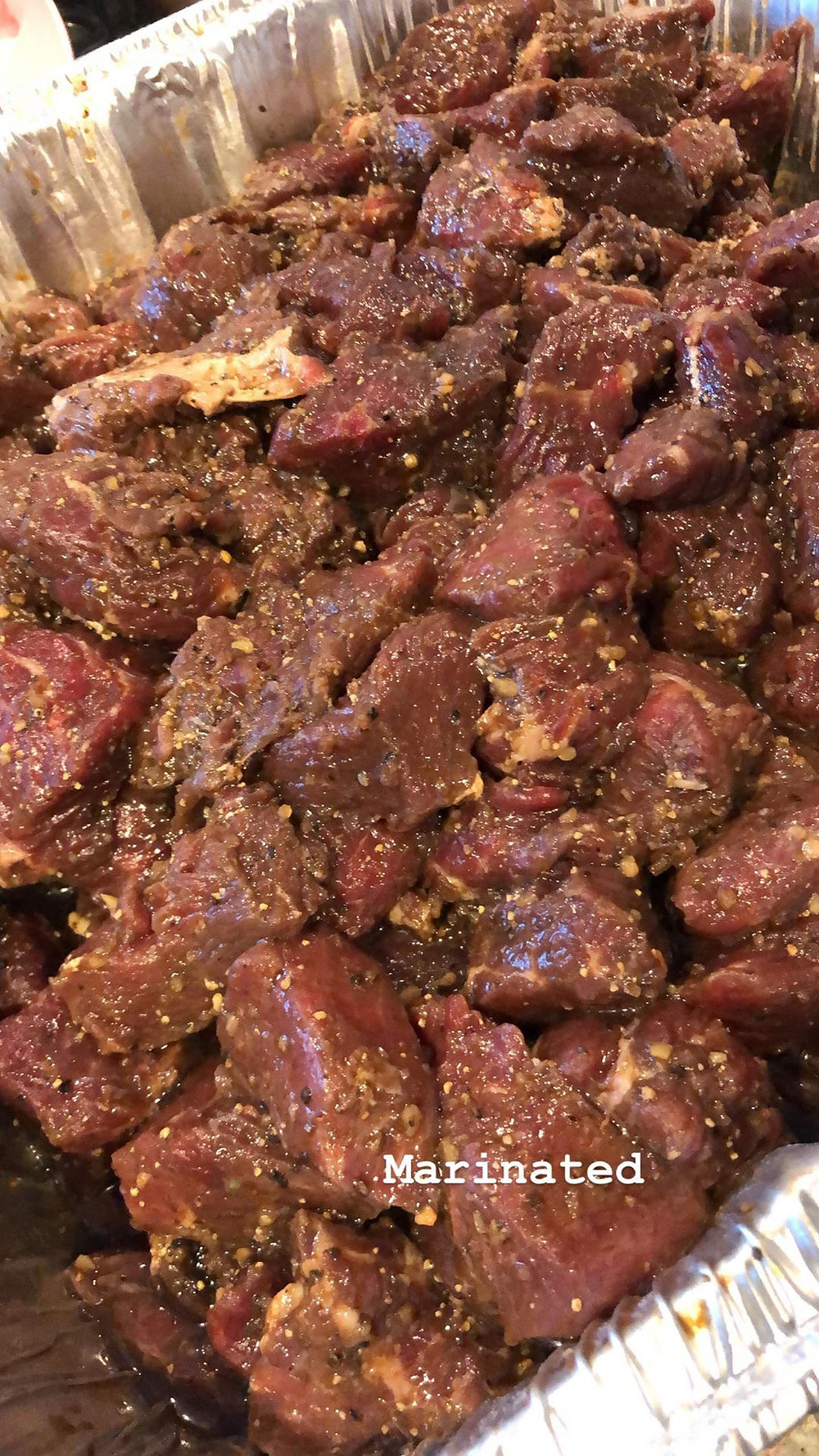 8 pounds of steak, cubed and marinated.