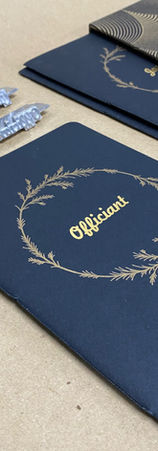 Custom designed and printed wedding vow books for the bride, groom and officiant.