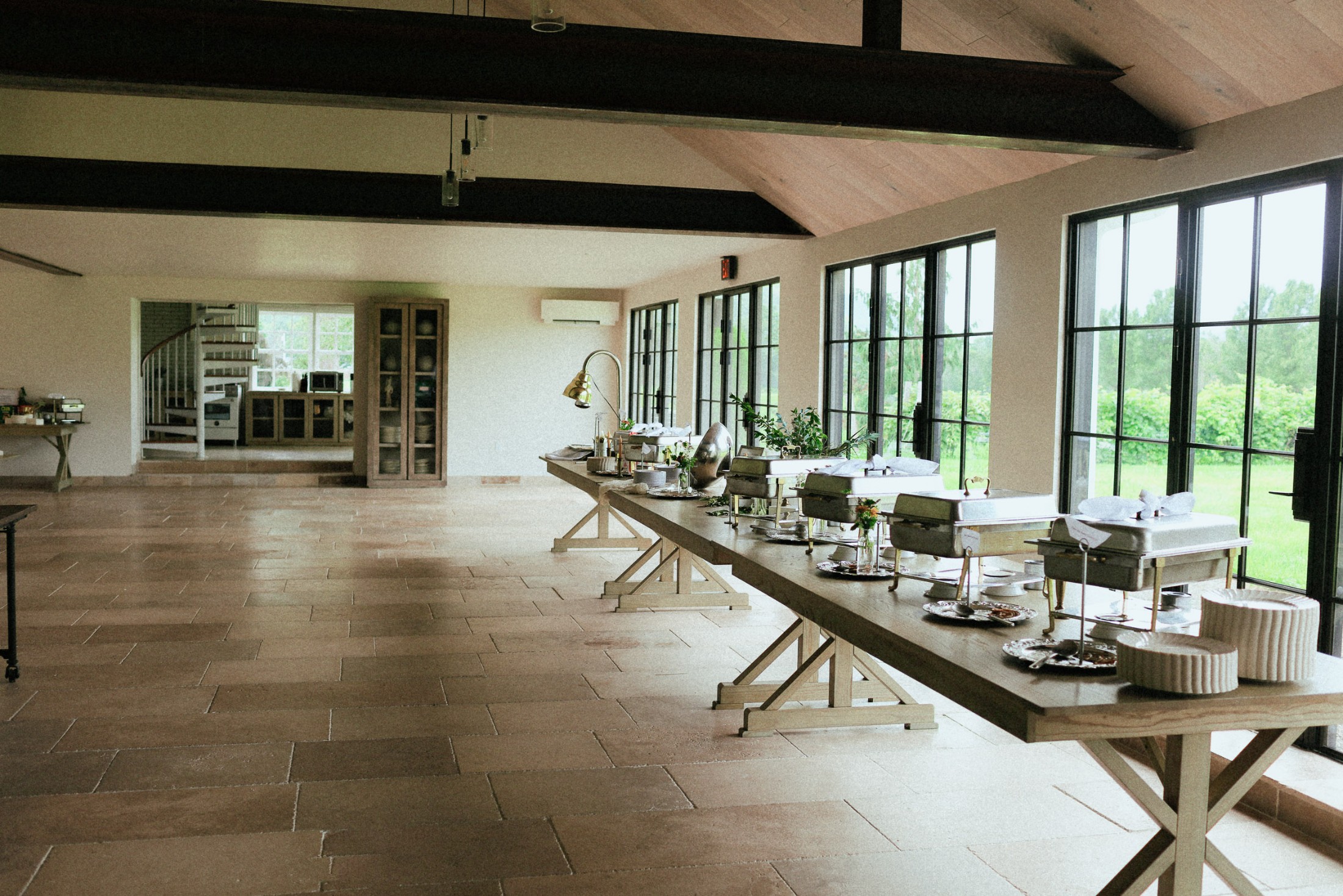 A buffet line set the length of the windows in the lower Barn