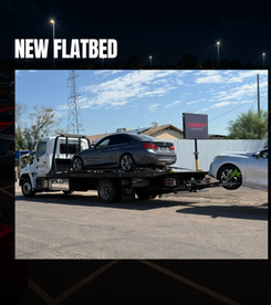 Equipped with flatbed transport for secure and damage-free vehicle handling.