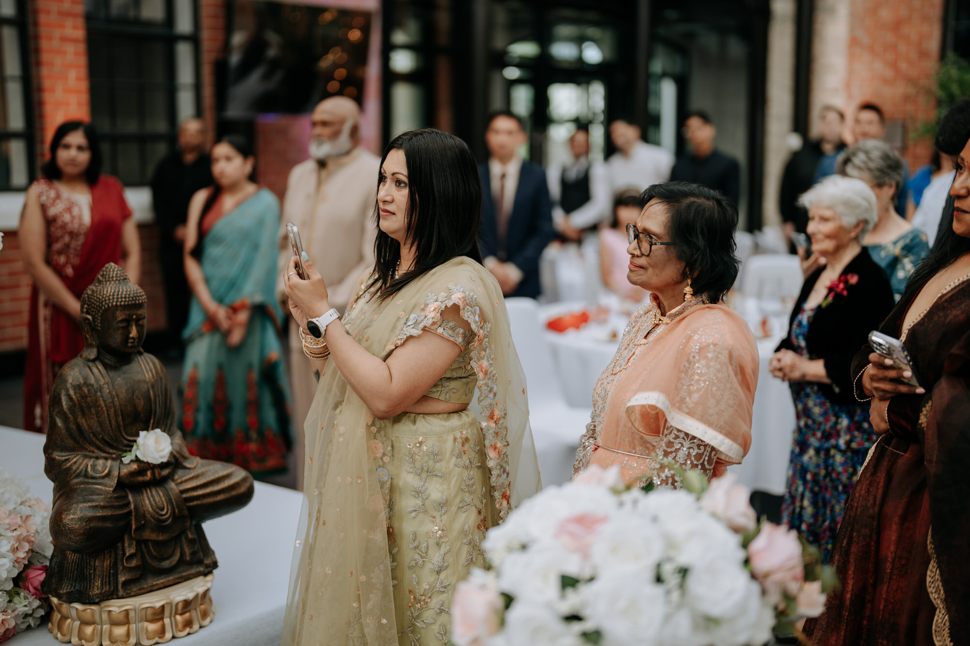 A candid moment from Noelle and Nash’s Hamilton Gardens wedding (47 of 143)