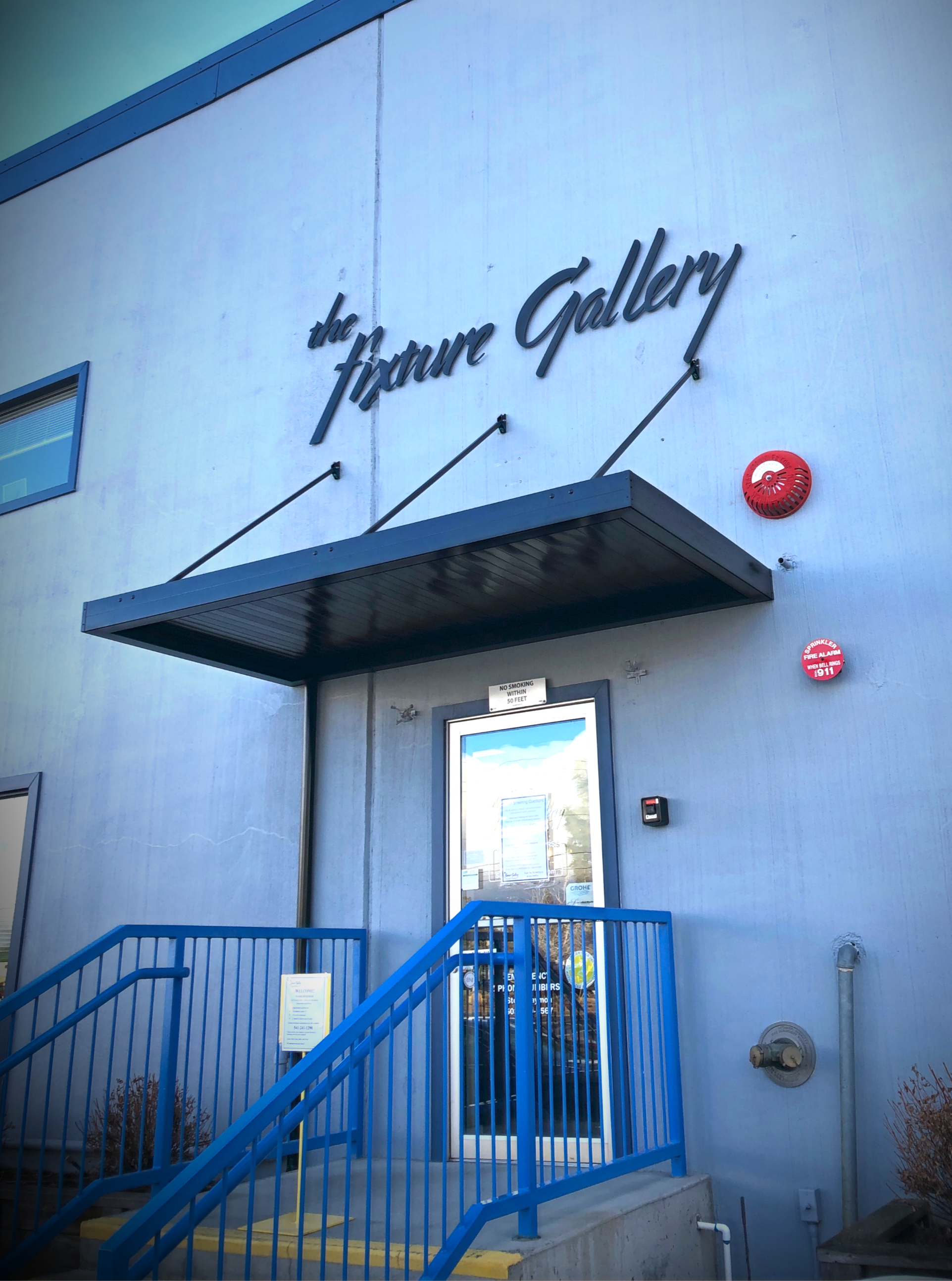 Flat style custom awning and powder-coated aluminum letters