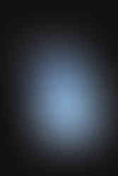 A framed photograph of my grandparents, displayed in their home. The image is faded. 