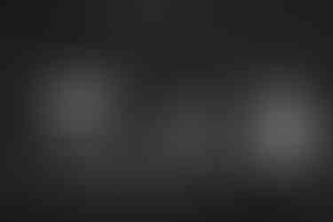 One of serveral surfaces in my grandmother’s home covered with framed photographs.