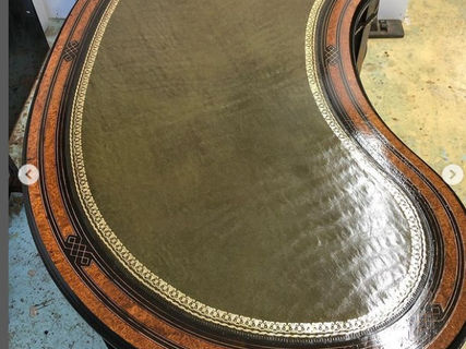 Gillows ebony and amboyna kidney desk all finished.