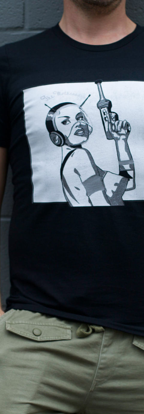 Black shirt with large 1960s atomic girl design.